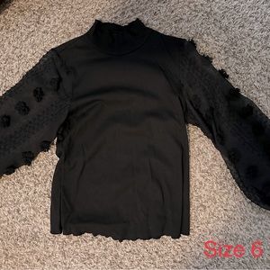 Black sheer puffer sleeve top